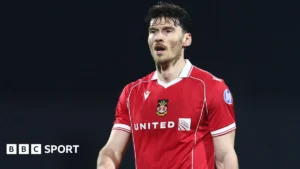 Wrexham Striker Kieffer Moore Ruled Out of Wales’ World Cup Play-Offs with Hamstring Injury