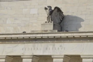 Bitcoin Reclaims $64,000 as Market Sentiment Braces for Federal Reserve Interest Rate Decision Amid Conflicting Forecasts