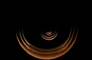 NASA’s Psyche Mission Successfully Executes Mars Gravity Assist, Capturing Striking Visuals of the Red Planet.